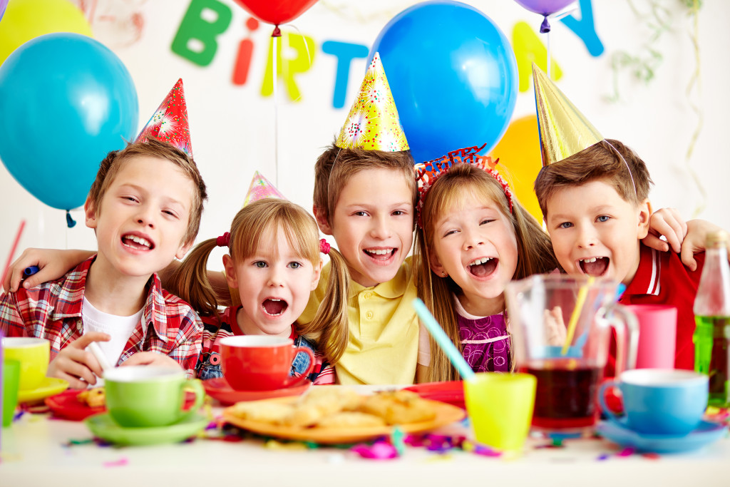 A group of adorable kids having fun at a birthday party
