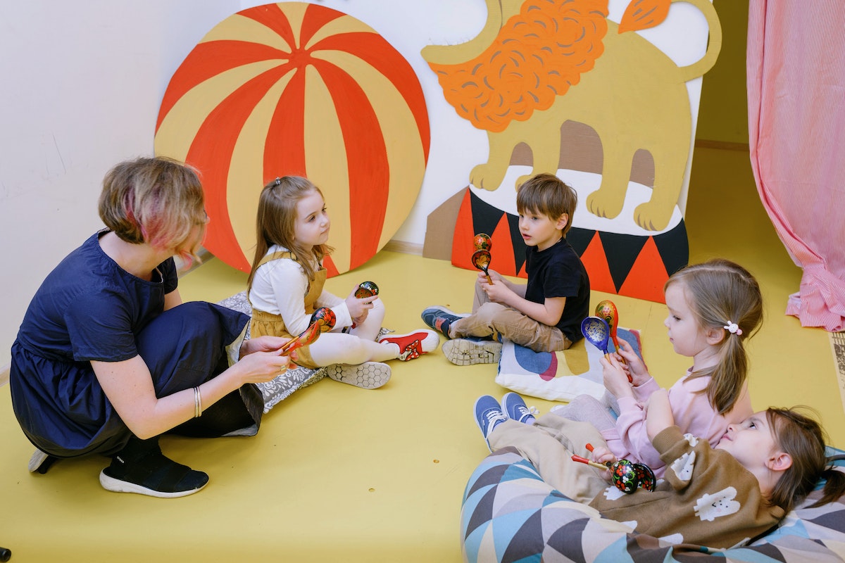 Children Playing on Yellow Floor